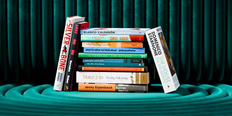 The International Booker Prize longlist books photographed stacked..